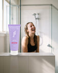 hideaway. Aurora Rouge Body Scrub on a shower ledge in a bright bathroom