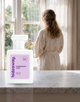 hideaway. Corporate Lady perfume 50ml bottle on a marble ledge by a sunlit window