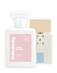 Hideaway. Ivory Bloom perfume 50ml beside the Giardini di Toscana Bianco Latte bottle it is inspired by