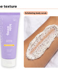 Exfoliating body scrub texture swiped on skin, beside Hideaway. Pineapple Coconut exfoliating body scrub