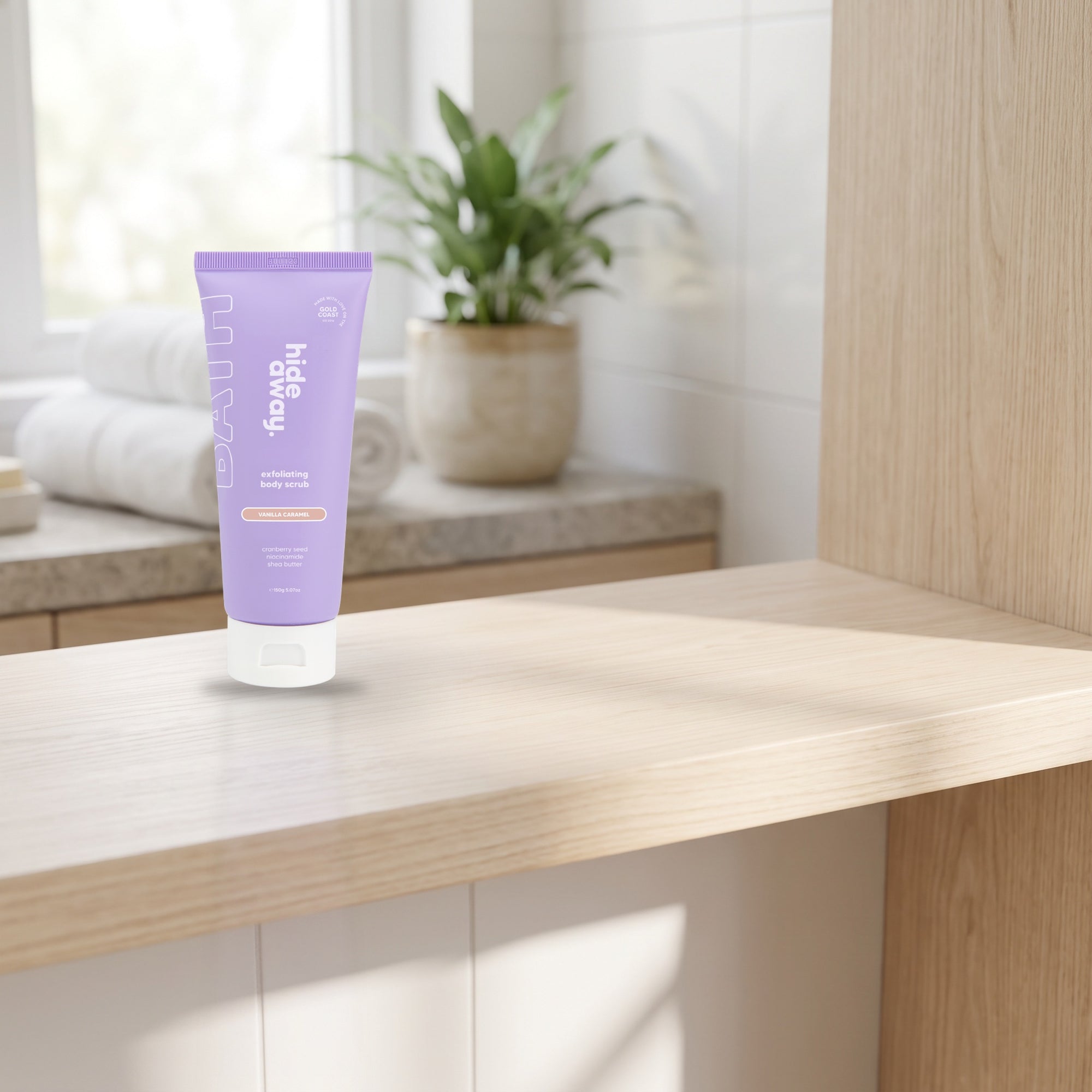hideaway. Vanilla Caramel Body Scrub on a stone bathroom counter in soft daylight