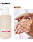 Hand wash texture lathered between hands, beside Hideaway. Aurora Rouge hand wash