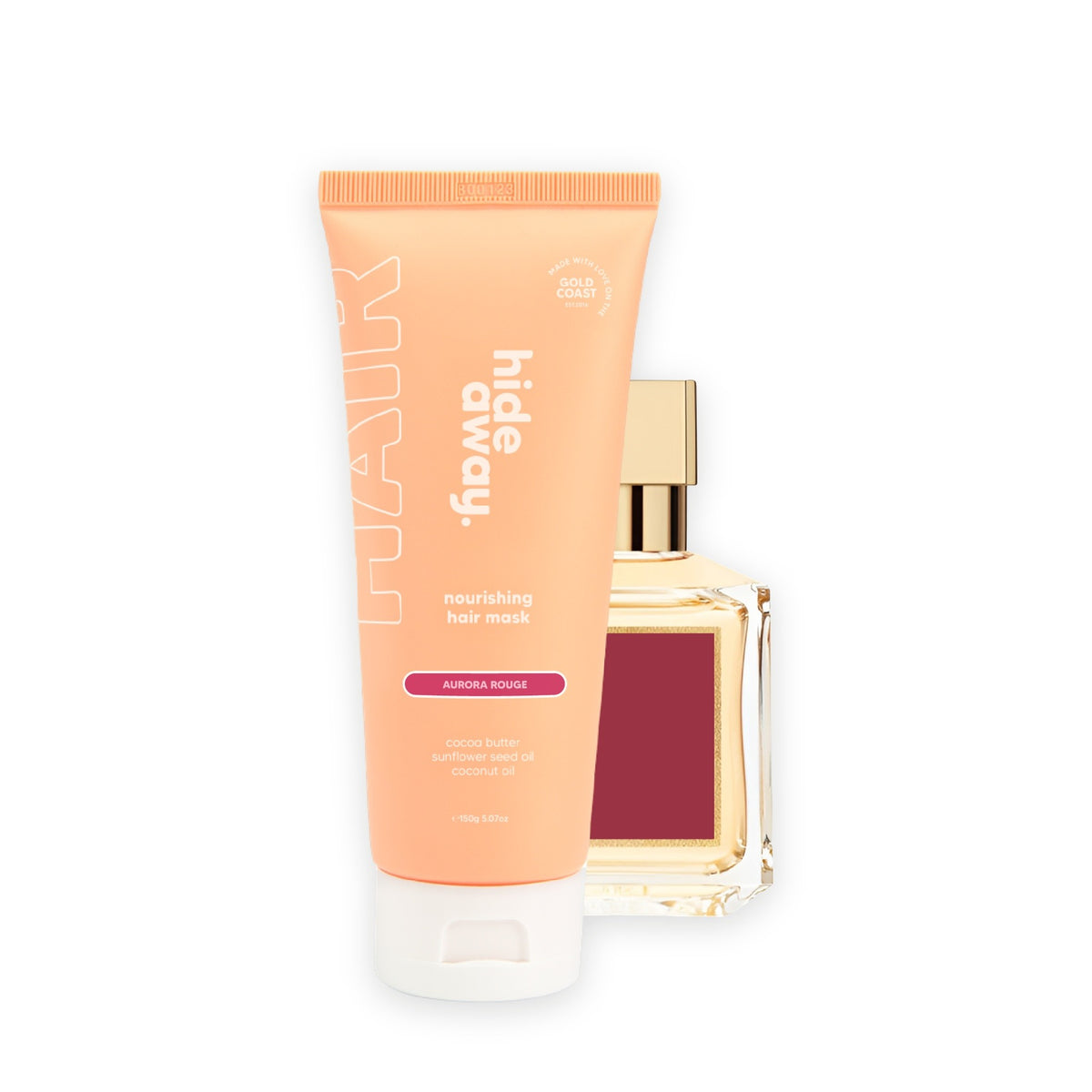 Hideaway. Aurora Rouge hair mask beside the MFK Baccarat Rouge 540 bottle it is inspired by
